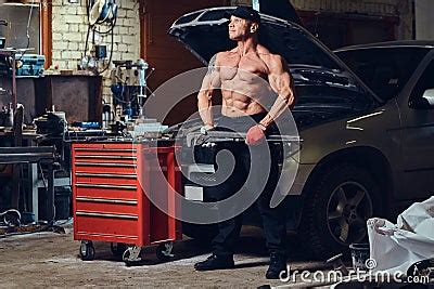 Shirtless Mechanic In A Garage Stock Photography CartoonDealer Com