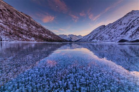 Sunset On The Frozen Lake By Anton Petrus