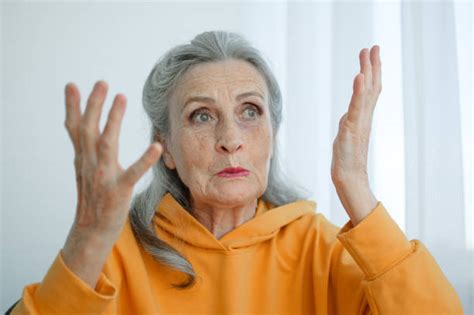40 Angry Old Woman Shakes Her Fist Stock Photos Pictures And Royalty