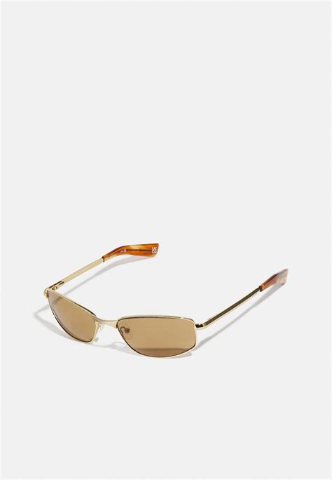 Le Specs Star Beam Unisex Sunglasses Bright Gold Coloured Gold Coloured Zalando De