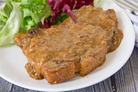 Generously season each side of the pork. Southern Smothered Pork Chops Recipe - Foodgasm Recipes