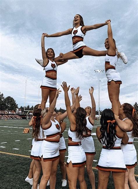 cheer stunts in 2020 with images cheer stunts cheer poses cute cheer pictures