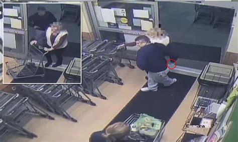 Shocking Moment Man Sticks Woman With A Syringe At The Entrance To A Maryland Supermarket