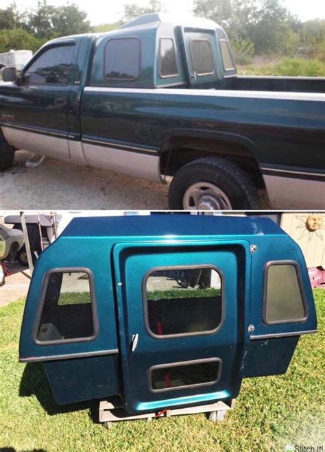 Blue Pickup Truck With Cowboy Sleeper Camper