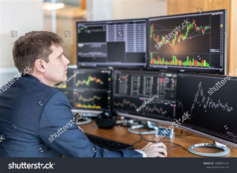 Businessman Trading Stocks Stock Traders Looking At Graphs Indexes