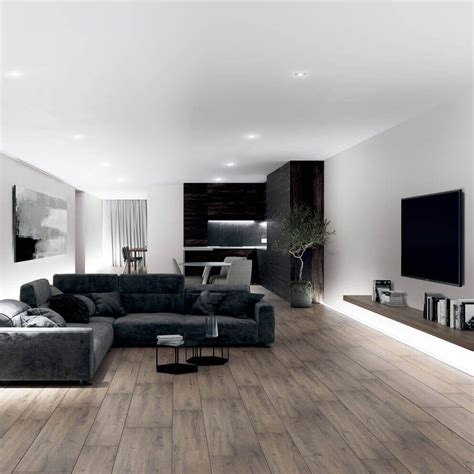 For a unique living room floor, you can create a feature area in the centre of your space. Baltic Oak Wood Effect Wall And Floor Tiles | Modern furniture living room, Black living room ...