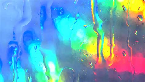 Rain Falling On Window Bright Colorful Background With Water Drops Stock Footage Video