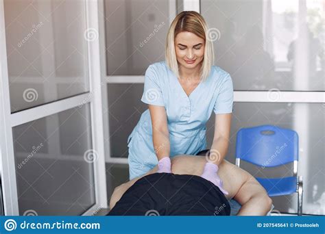 The Doctor Massages The Man In The Hospital Stock Image Image Of Therapist Occupation 207545641