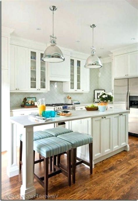 Large kitchen featuring a center island with a peninsula set on a hardwood flooring lighted by pendant and recessed lights. Kitchen Island Long Skinny Kitchen Island Full Size Of ...