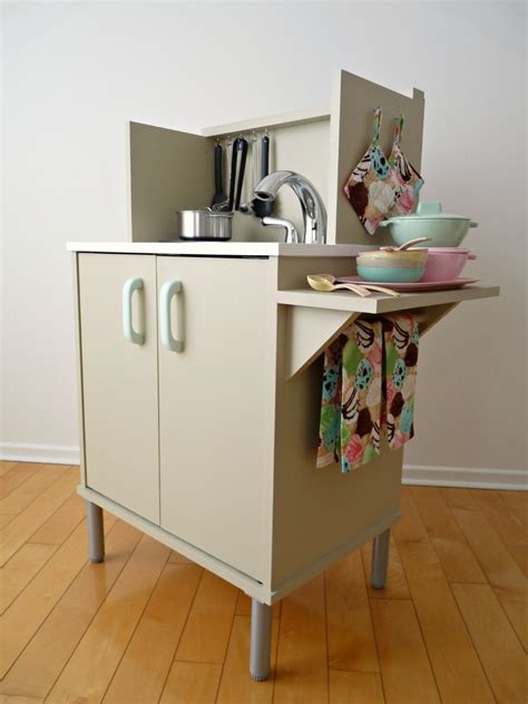 Does it feel like little plastic eggs multiply in your home with every easter? DIY Play Kitchen before and after - DIY Show Off ™ - DIY ...