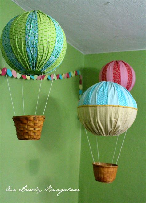 Alternate balloon sizes and skip holes as needed on the decorating strip as you attach balloons. Hot Air Balloon Decorations