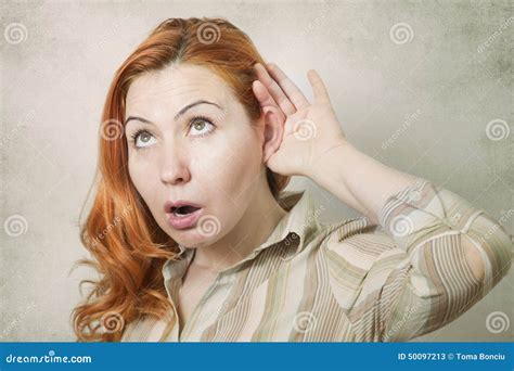 Young Woman With Hand To Ear Listening Stock Image Image Of Chat