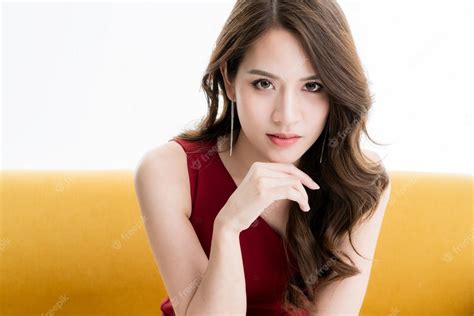 Free Photo Beautiful Attractive Elegance Asian Woman In Red Dress Sit And Relax Model Pose On