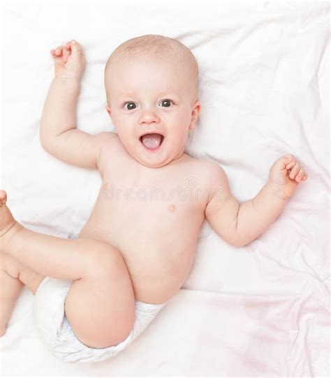 Baby In Diaper Sitting On The White Bed Stock Image Image Of Adorable