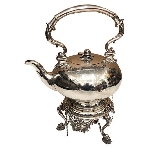 Antique English Silver Plated Tipping Teapot Or Kettle With Helmut Top
