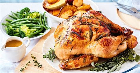 serve this traditional roast turkey with homemade gravy and roast vegetables herb roasted