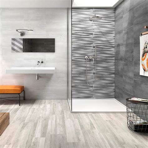 Looking for some bathroom tile ideas? Rust Light Grey Wall Tiles | Grey wall tiles, Grey ...