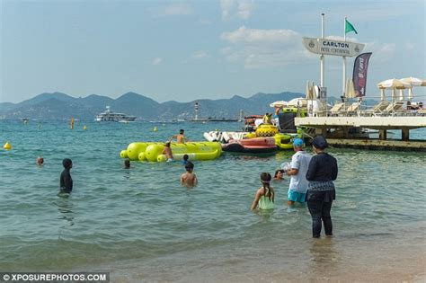 Burkini Ban Armed Police Force Woman To Remove Swimwear On Nice Beach