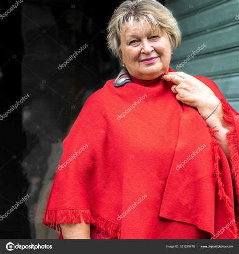A Thoughtful Mature Plump Woman Walks The Streets Of The Old Cit Stock Photo By Ramvseb