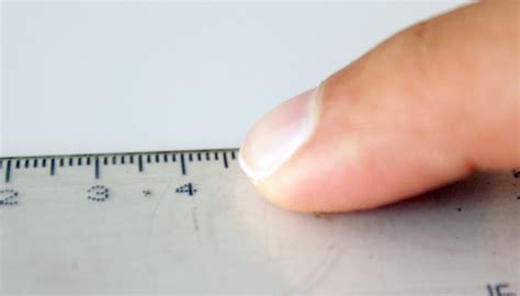 This will indicate the whole unit length of the object, example: How to Read a Ruler in Centimeters, Inches & Millimeters | Sciencing