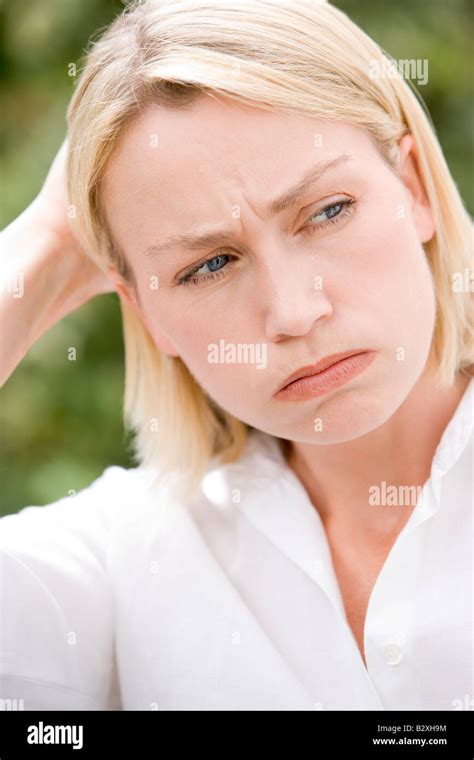 Head Shot Of Woman Scowling Stock Photo Alamy