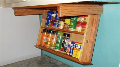 Unscrew the mounting points where the cabinet is secured to the wall. Pull-Down Spice Rack from "Kitchen Storage Solutions" | Spice rack storage, Spice rack