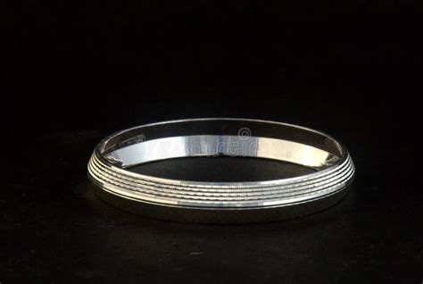Silver Bangles And Gents Kade And X28 Hand Band And X29 Stock Photo
