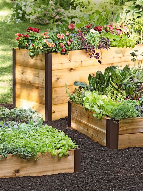 The soil in raised vegetable garden beds typically warms earlier in spring than the surrounding earth. Elevated Cedar Raised Bed Kit, Elevated Bed | Made in Vermont