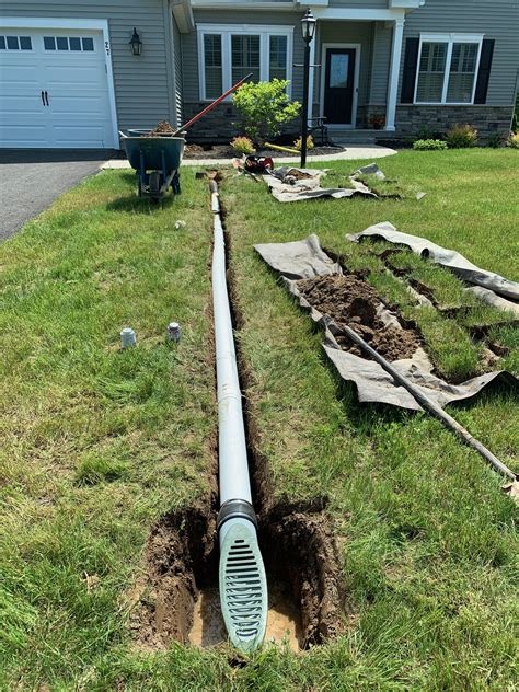 I have a hunch that the upper leak is caused by the sharp angle of the black adapter connector. Foundation French Drain and Gutter Downspout Drainage ...