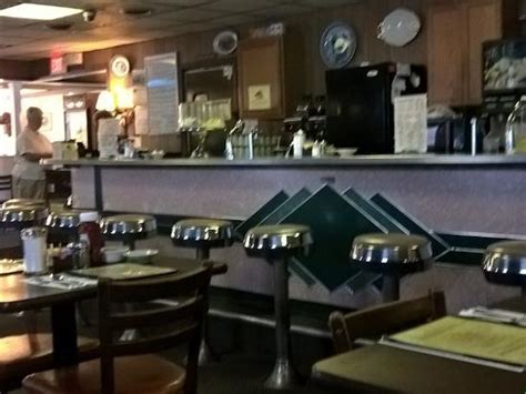 A small diner with an even smaller mustang. Typical Small Town Diner - Picture of Hall's Family ...