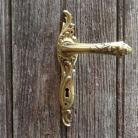A Pair Of Exquisitely Detailed Brass French Metal Door Handles And