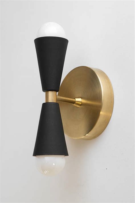 By installing the wall sconces in this manner, it offers a minimalist approach to both the atmosphere of the space as well as the dimensions of the room. Black Gold Sconce Mid Century Wall Sconce Cone Wall Light ...