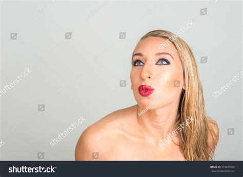 sexy nude blonde woman blowing kiss ภาพสต็อก 333970568 shutterstock