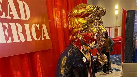 golden trump statue turns heads at cpac cnnpolitics
