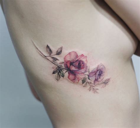 Subtle Black Wildflower Tattoo