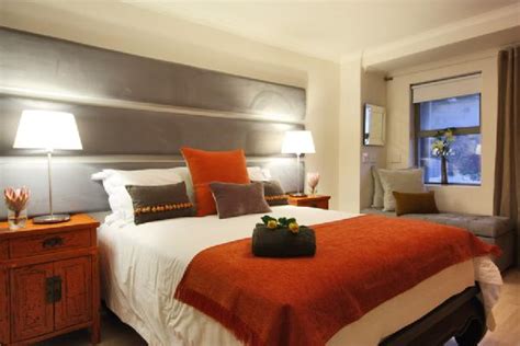 gray  orange bedding contemporary bedroom