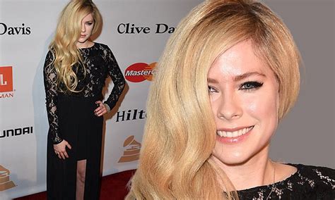 Blonde Bombshell Avril Lavigne Opts For Black Lace As She Leads