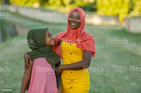 Loving Emotions Between Muslim Mother And Daughter Stock Photo
