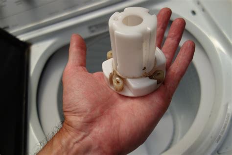 Hi i find it difficult to remove the agitator of my apartment size kenmore, when i wash my cloths it leaks and my kitchen become flooded, so i thought of remove the machine and see where is the leak. Last ditch effort to self-repair Kenmore 70 series. : fixit
