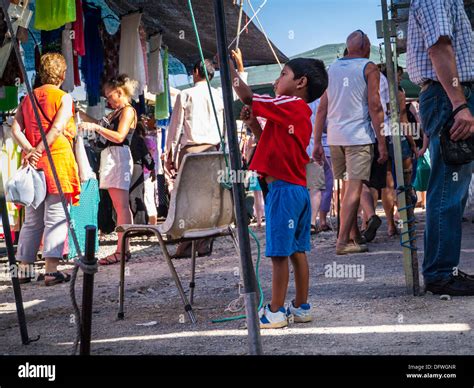 Portugal Algarve Loule Gypsy Market Young Lad Boy Playing Stall Ropes