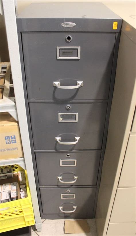 Maybe you would like to learn more about one of these? FOUR DRAWER GREY FILING CABINET NO KEYS - Kastner Auctions