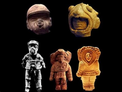 Mayan Figurines In Space Suits Complete With Helmet And Headgear