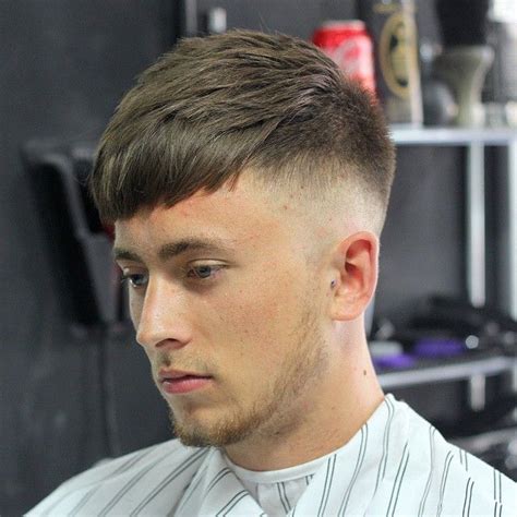 Haircut low fade with fringe. Skin fade with a heavy fringe choppy messy texrurised ...