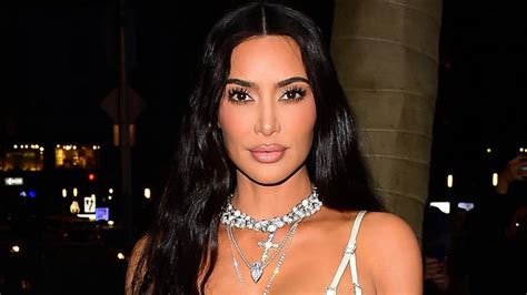 Kim Kardashian Steals The Show As She Goes Braless In Silk White Dress