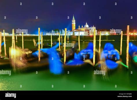Gondolas Moored By St Marks Square In Venice At Night Stock Photo Alamy