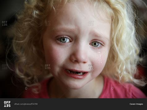 Close Up Portrait Of Girl Crying At Home Stock Photo Offset