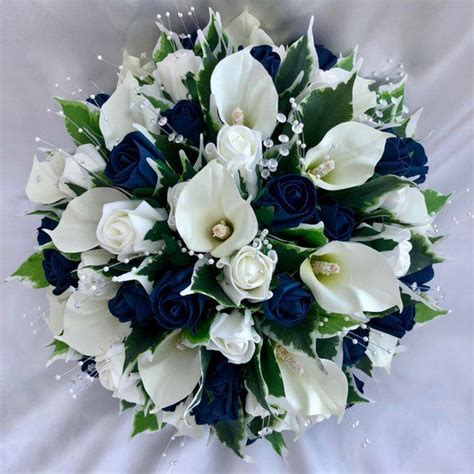 This wedding bouquet from jensbowdaciousbows is a feminine. Artificial Wedding Flowers, Bride, Bridesmaids Posy ...