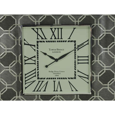 Square wall clock is constructed galvanized metal that's been lightly distressed for an aged vintage look. Tribeca Square Wall Clock with Roman Numerals | OJCommerce