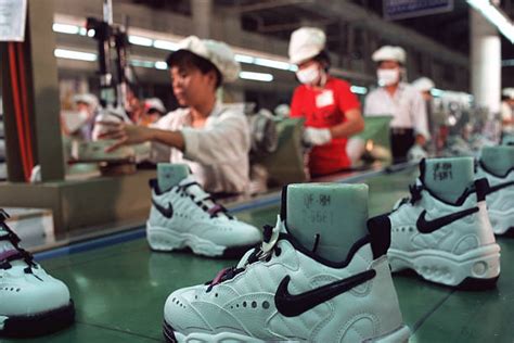Workers In A Nike Factory Near Ho Chi Minh City Work At A Pictures