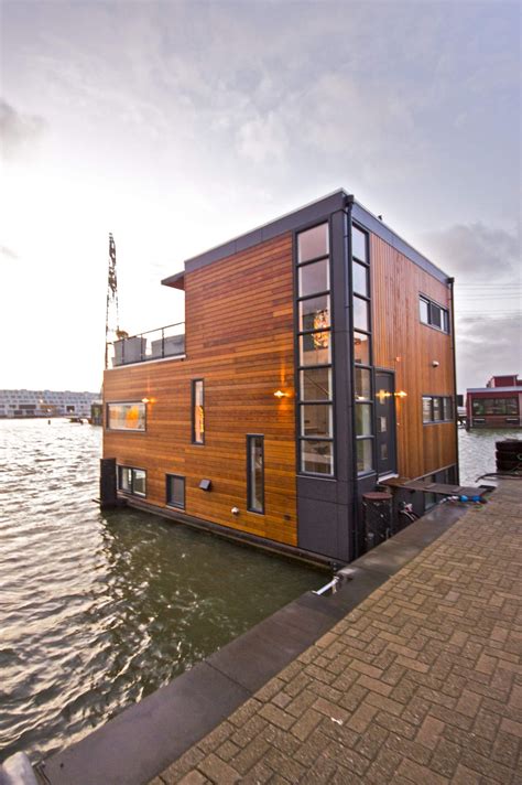 12 Incredibly Awesome Houseboats Houseboat Living Water House Floating Architecture